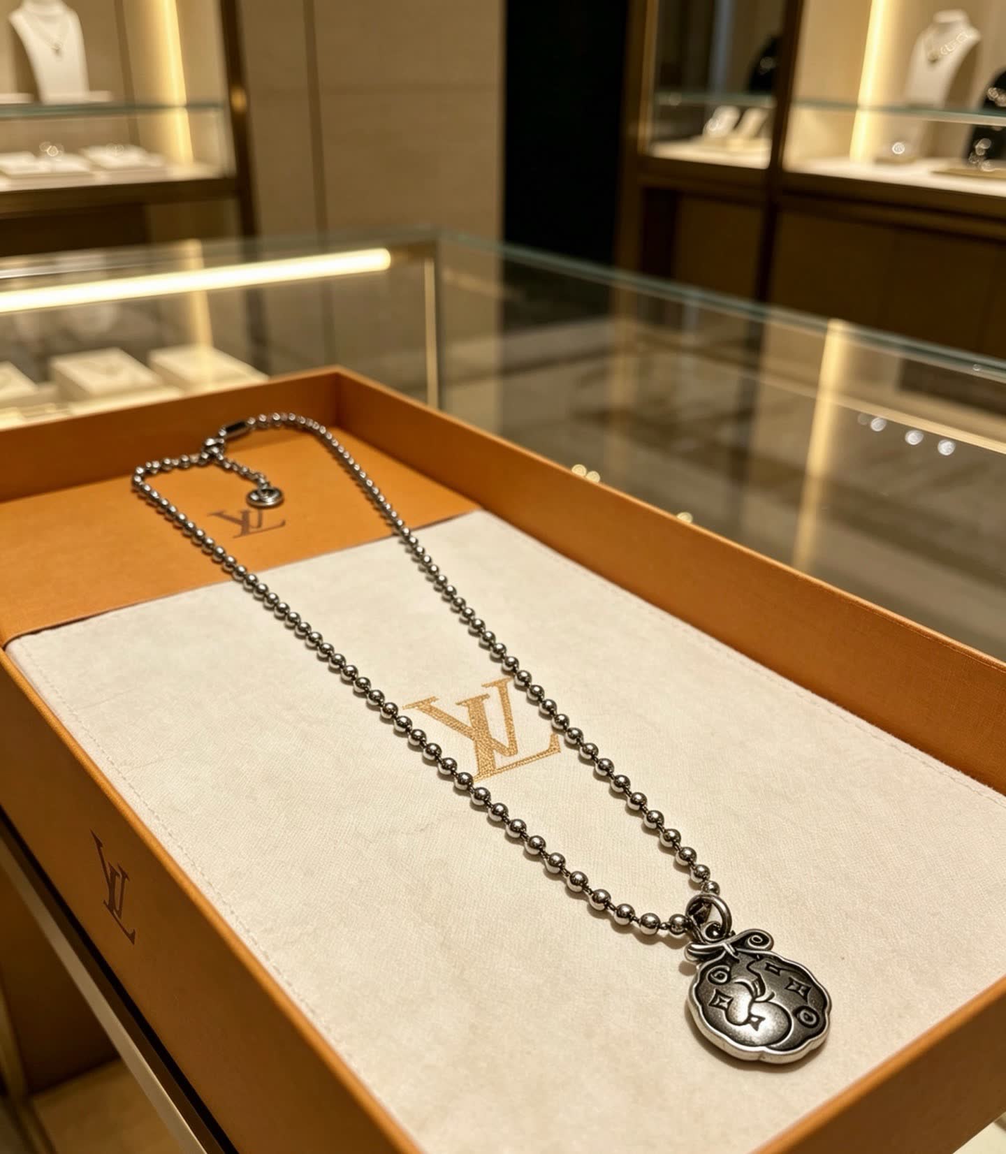 Louis Vuitton Silver Beaded Necklace with Round Pendant